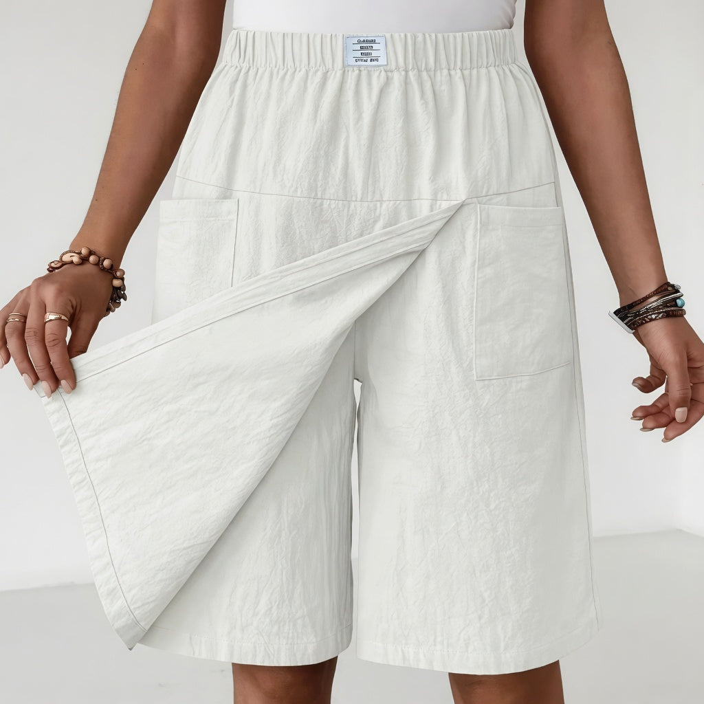 Skort feminino envolvente, saia-calção confortável com cintura elástica. Peça versátil para uso diário e verão.