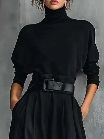 Conjunto feminino moderno: camisola de gola alta e calças retas. Ideal para conforto e elegância no dia a dia.