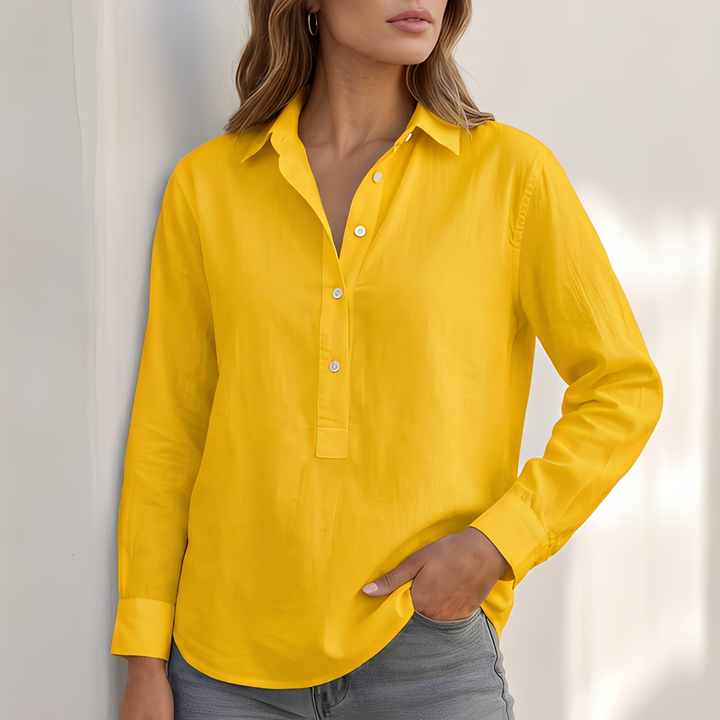Camisa feminina com gola V e punhos elegantes, ideal para o verão. Roupa casual e de estilo para a mulher moderna.