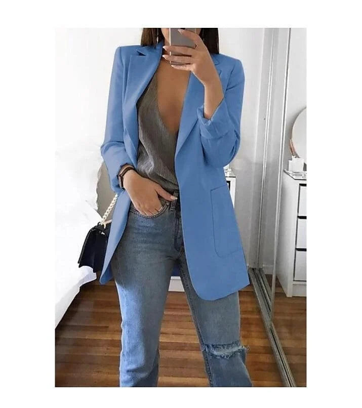 Jaqueta blazer feminina azul marinho, versátil para looks de dia e noite. Tendência.