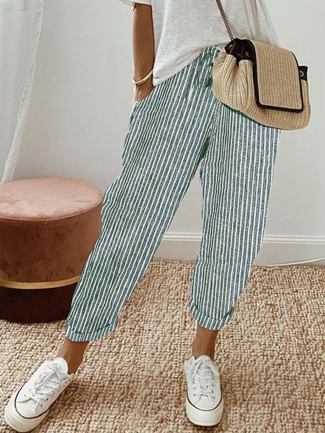 Calças femininas Mel: moda verão com conforto e estilo. Peça essencial para seu guarda-roupa.