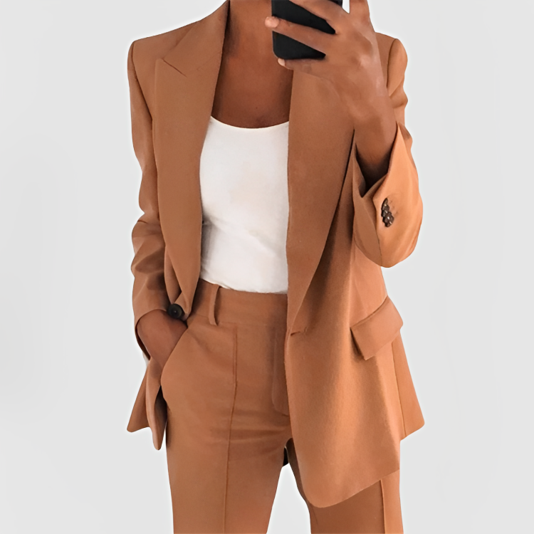 Blazer feminino e calça de alfaiataria. Conjunto versátil para moda feminina e look profissional.