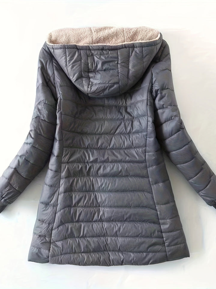 Jaqueta longa feminina moderna, casual para meia estação, com zíper. Moda urbana e versátil.