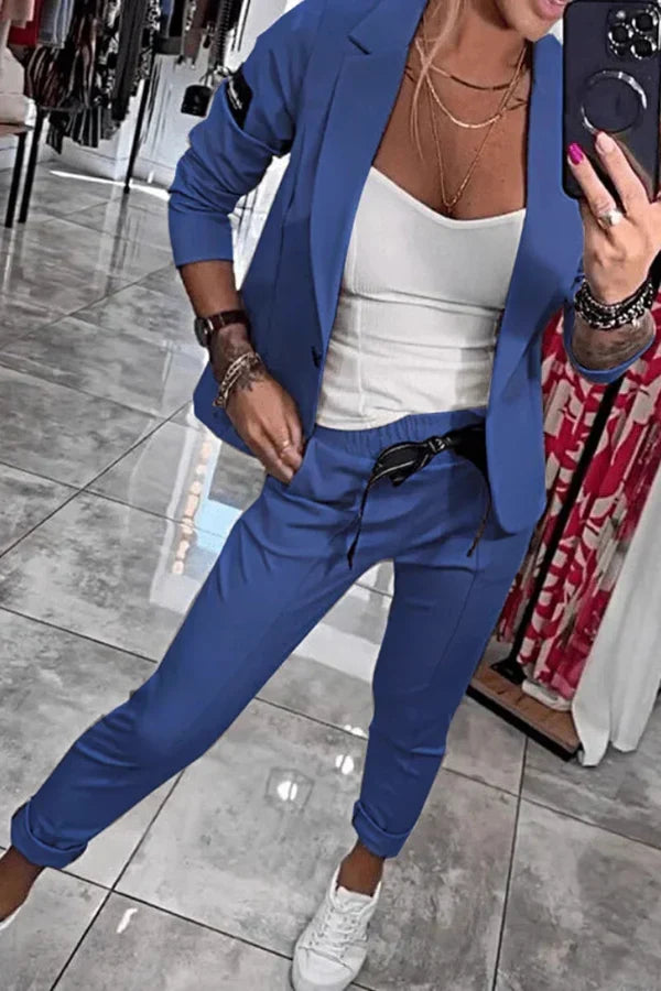 Sinta-se confortável e elegante com este conjunto feminino de jaqueta aberta e calça jogger versátil.