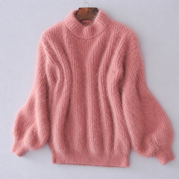 Pulôver feminino de gola alta para inverno. Blusa solta e confortável, essencial para moda casual e feminina no outono.