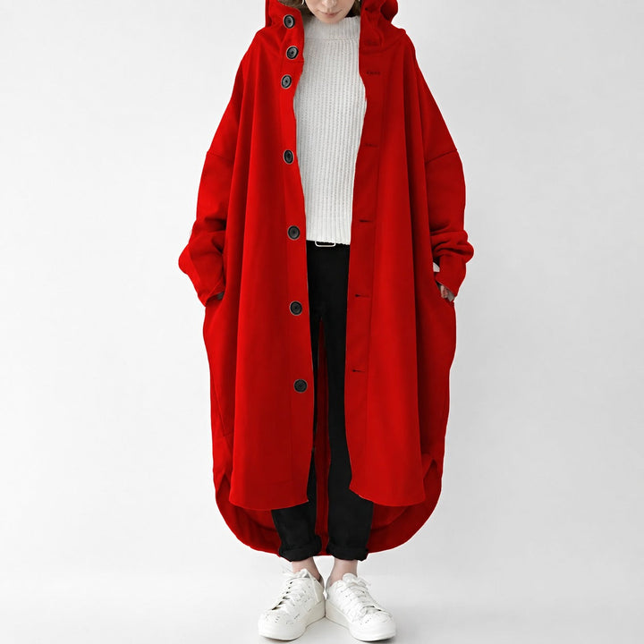 Trench coat feminino solto, silhueta alongada. Ideal para um agasalho elegante e casual de inverno.