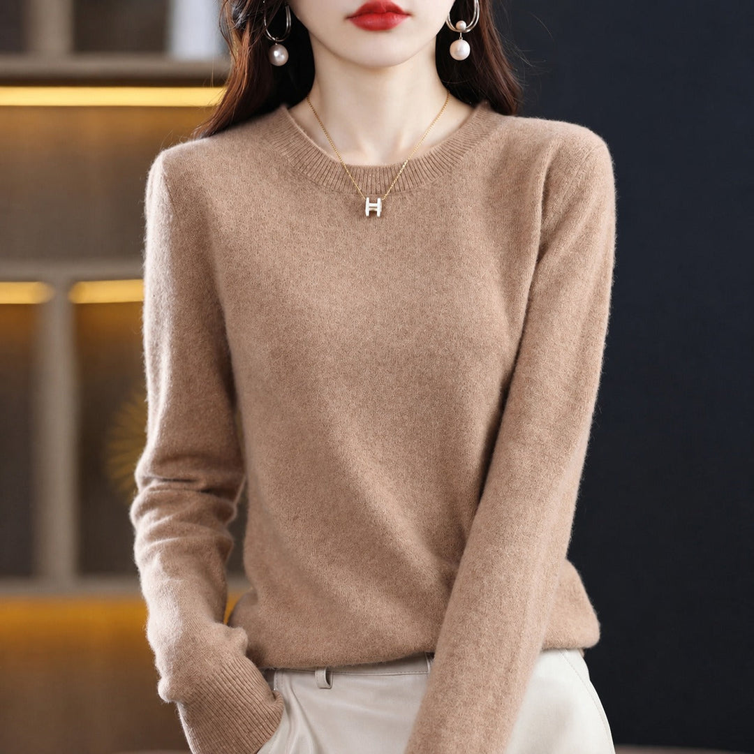 Pulôver feminino casual e elegante, gola redonda, essencial para o guarda-roupa de inverno.