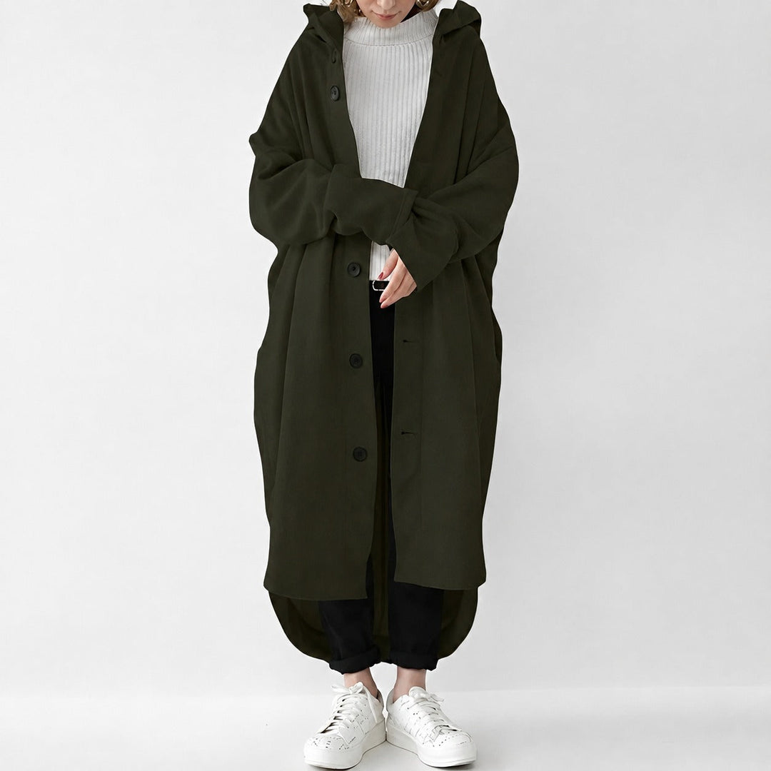 Trench coat feminino para inverno, longo e solto, combina calor com moda casual. Look elegante.