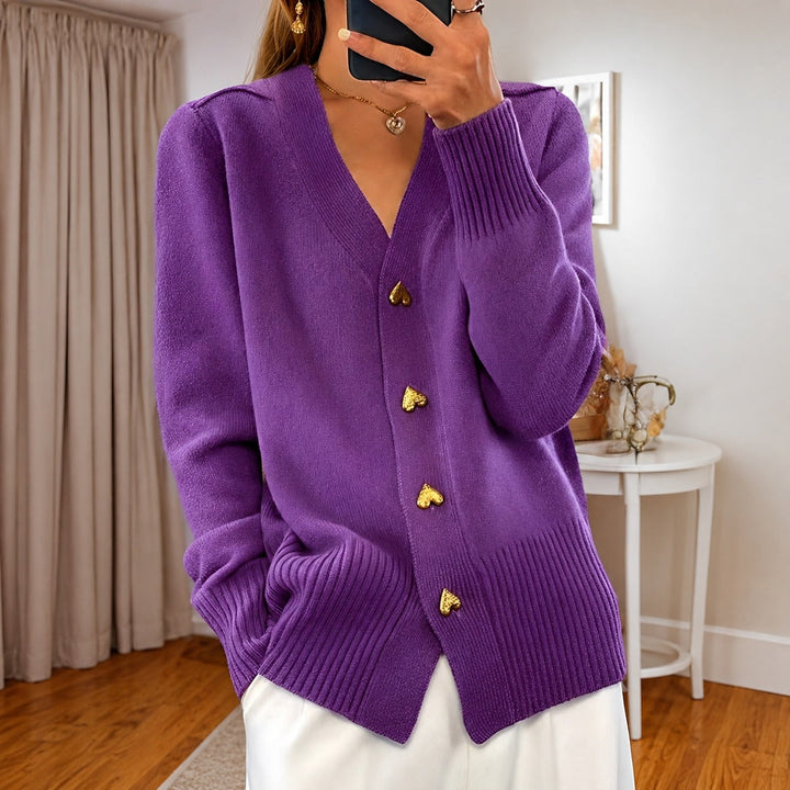 Cardigã feminino casual elegante com botões, peça chave para um outono-inverno confortável e estiloso.