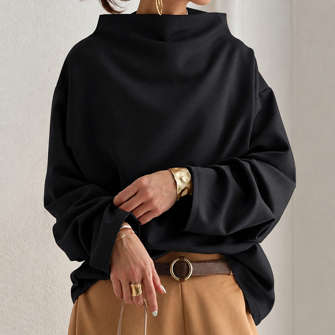 Blusa feminina elegante de gola alta e ajuste solto. Perfeita para um look sofisticado e confortável.