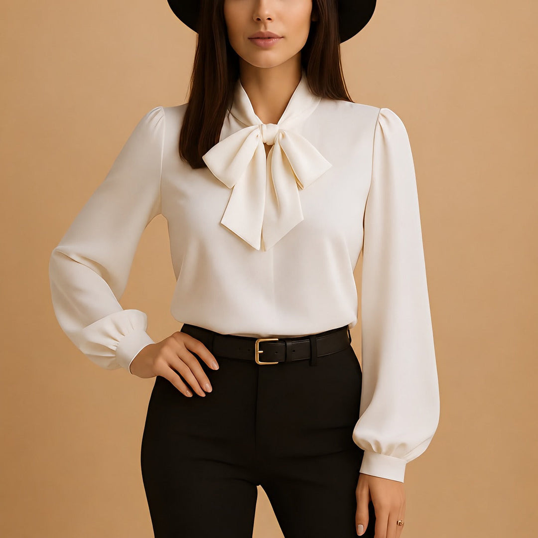Blusa feminina Blainne chic, com detalhes de laço, design moderno para um estilo casual ou formal.