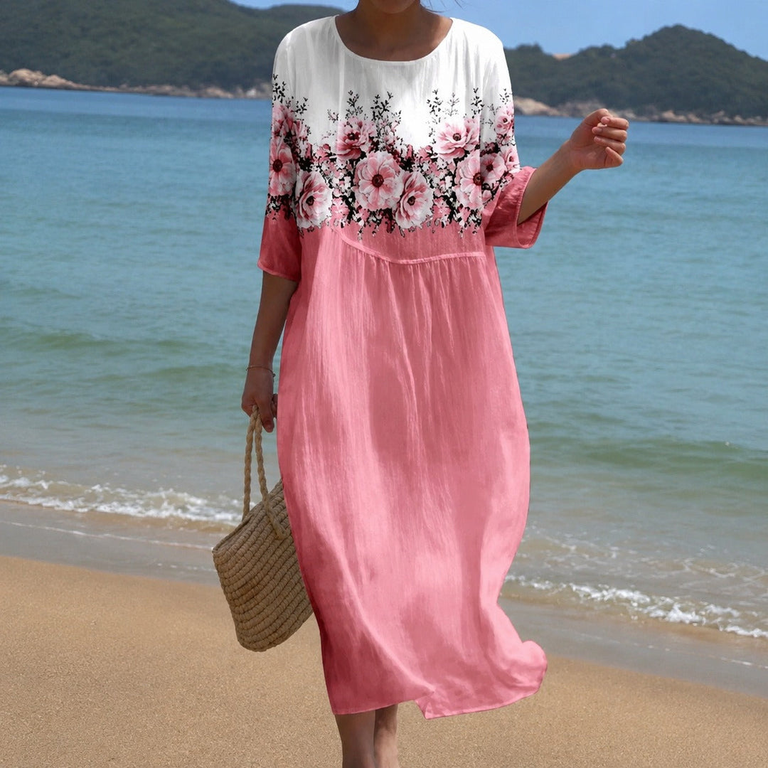 Vestido midi feminino, corte fluido, estampa delicada, look casual sofisticado para o verão.