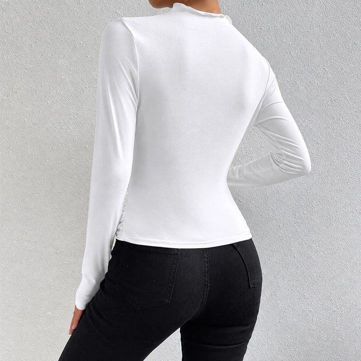 Roupa feminina: blusa de manga longa franzida, estilo elegante e confortável para todas as estações.