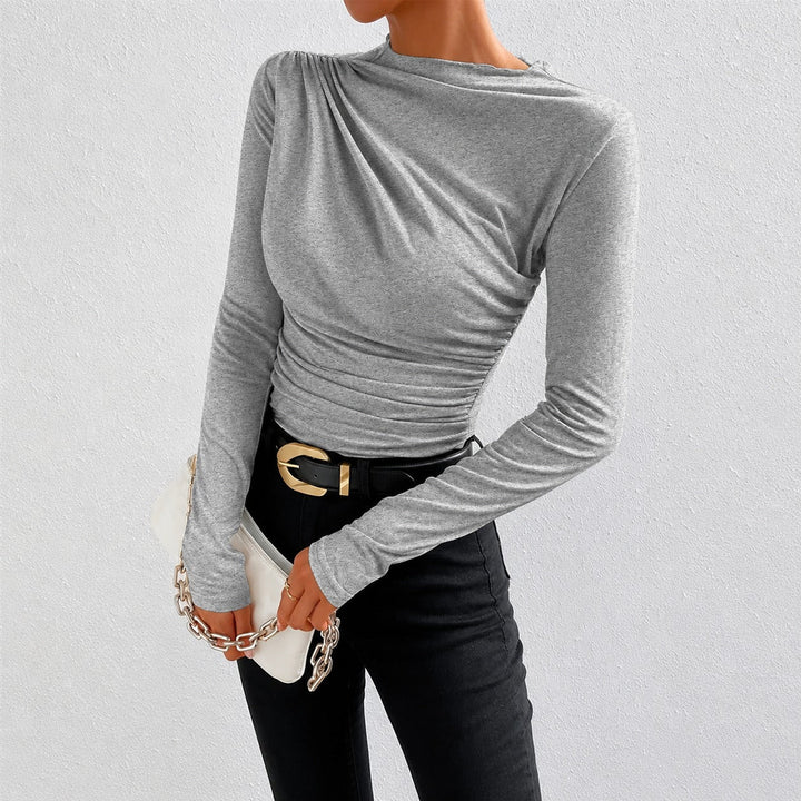 Blusa feminina elegante de manga longa com franzido, perfeita para adicionar estilo e conforto.