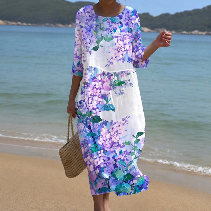 Vestido feminino midi fluido de verão, silhueta leve e elegante, perfeito para passeios e eventos.