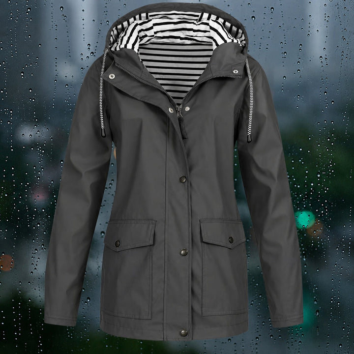 Casaco corta-vento feminino casual, com capuz, para proteção e estilo.