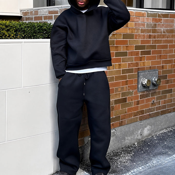 Moletom e calça oversize masculino para inverno, conjunto de roupa casual que proporciona conforto e estilo.