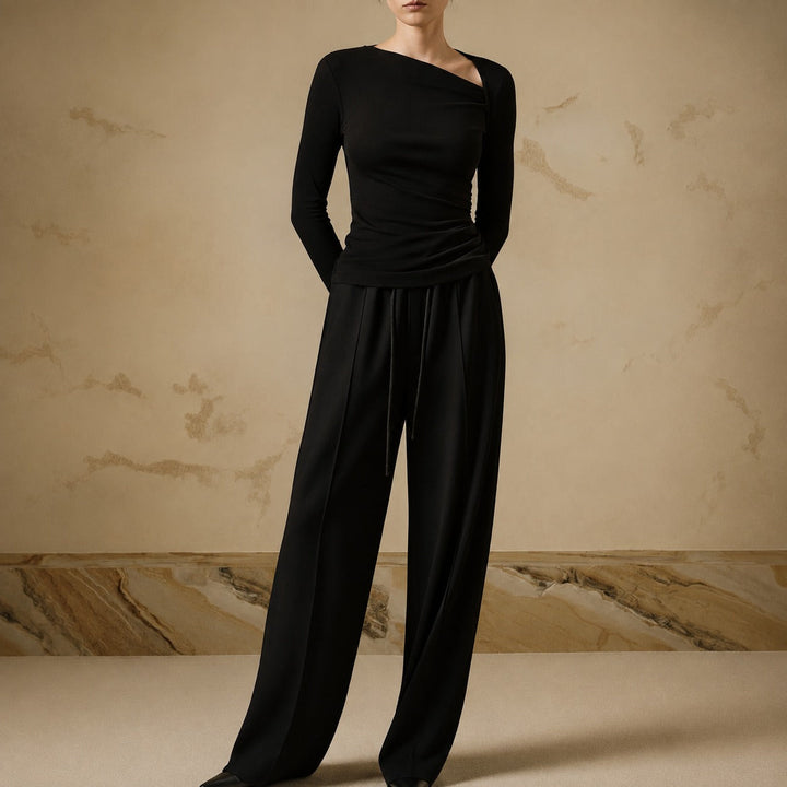 Top feminino de inverno, canelado com manga comprida e design assimétrico. Peça versátil para seu guarda-roupa.