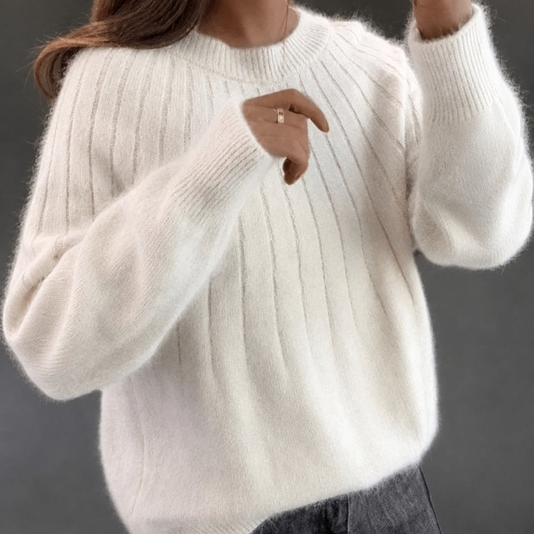 Suéter feminino elegante de malha, ideal para o dia a dia, conforto e estilo.