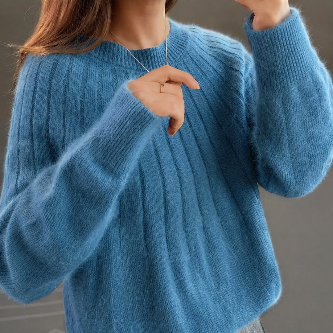 Suéter feminino de malha macia e elegante, perfeito para o inverno e uso diário.