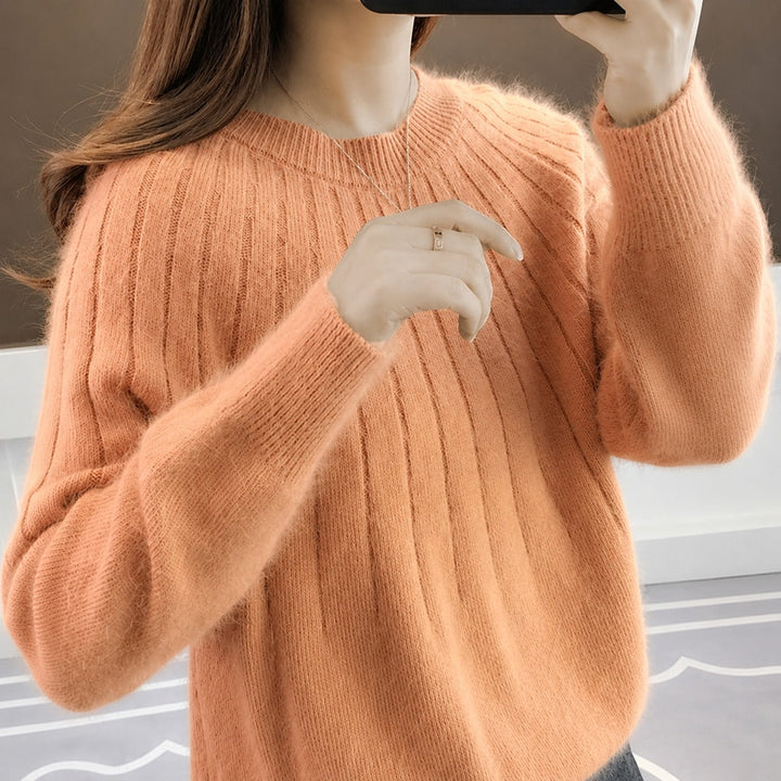 Suéter feminino de inverno para o dia a dia, proporcionando conforto, elegância e versatilidade.