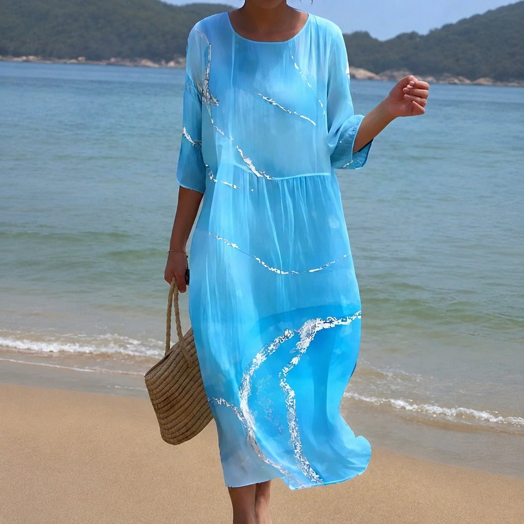 Vestido midi elegante feminino, tecido fluido e leve para o verão, perfeito para dias quentes.