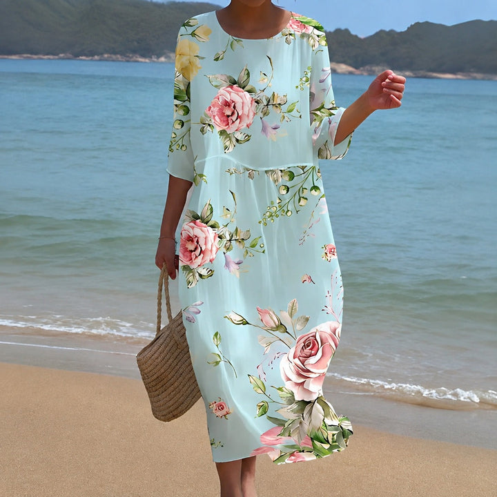 Vestido midi feminino fluido elegante para o verão, caimento perfeito e confortável.