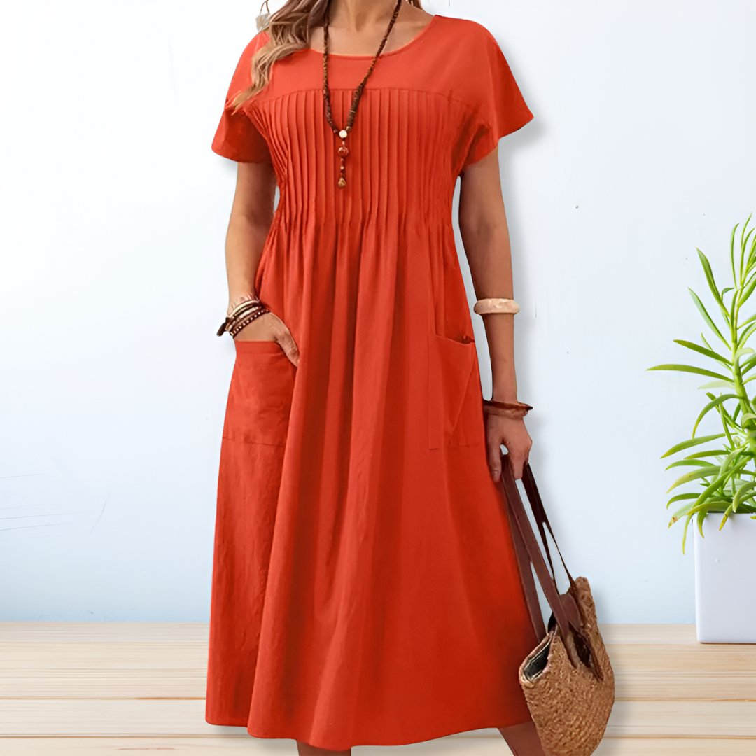 Vestido midi Leona feminino em cores vibrantes, tendência casual para o verão. Conforto e estilo relaxado para o dia a dia.