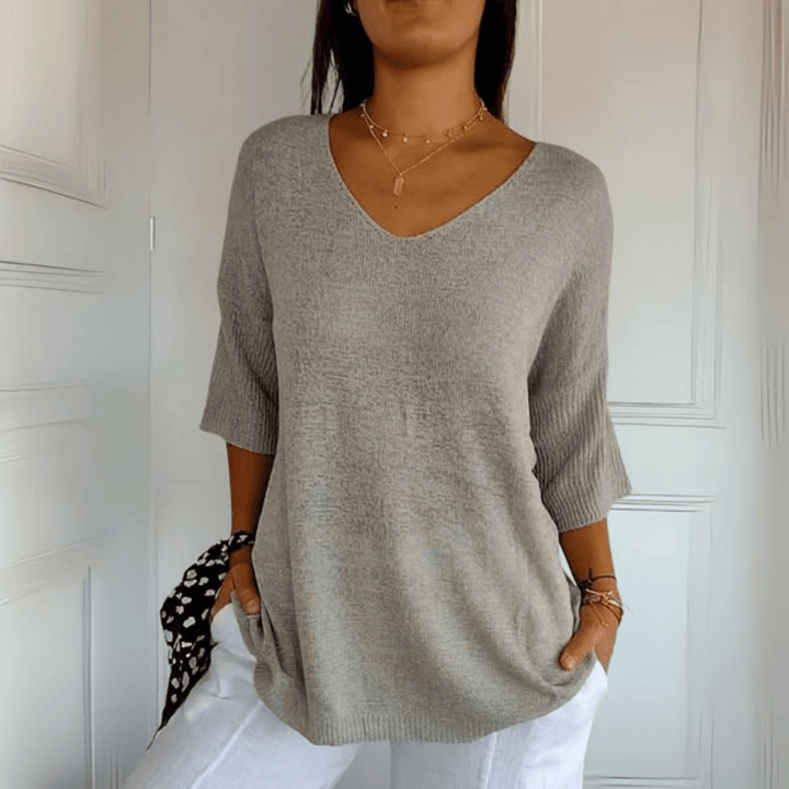 Blusa feminina elegante decote V. Versátil para o dia a dia, moda confortável para a mulher moderna.