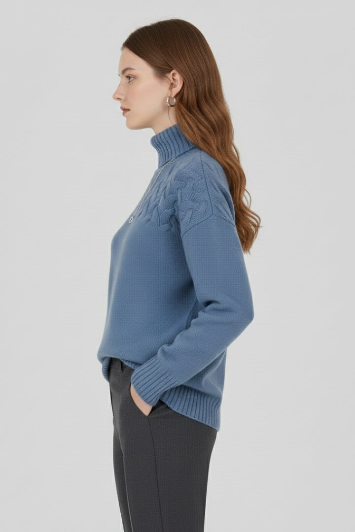 Roupa feminina de inverno: camisola de malha gola alta, padrão cable knit. Conforto e elegância para mulher.