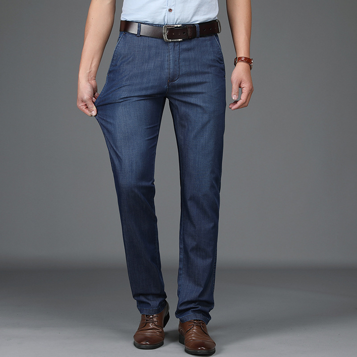 Jeans masculinos confortáveis com corte reto clássico, cintura alta, versáteis para o dia a dia.