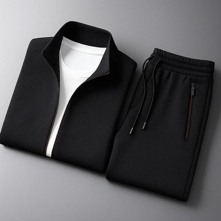 Blusão de fato de treino masculino com fecho frontal, ideal para desporto e estilo casual. Conforto garantido.