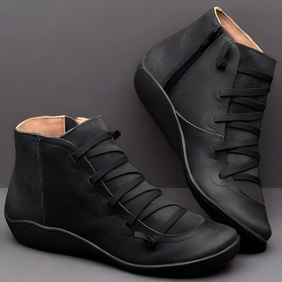 Botins femininos elegantes, com construção impermeável e palmilha confortável, perfeitos para o dia a dia.
