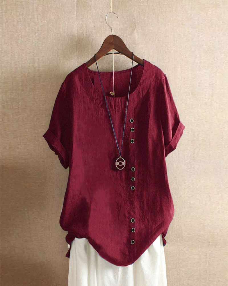 Blusa feminina casual, manga curta, gola redonda. Peça chave para um verão com estilo e conforto.
