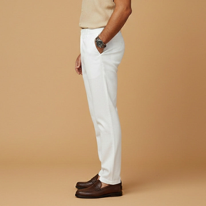 Calças casuais masculinas com cintura elástica e bolsos funcionais, de corte relaxado para um estilo prático e confortável.
