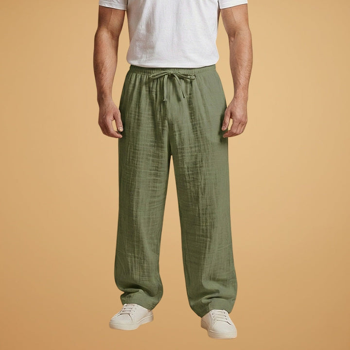 Calças de linho masculinas perna larga, cintura elástica. Verão com estilo e conforto casual.