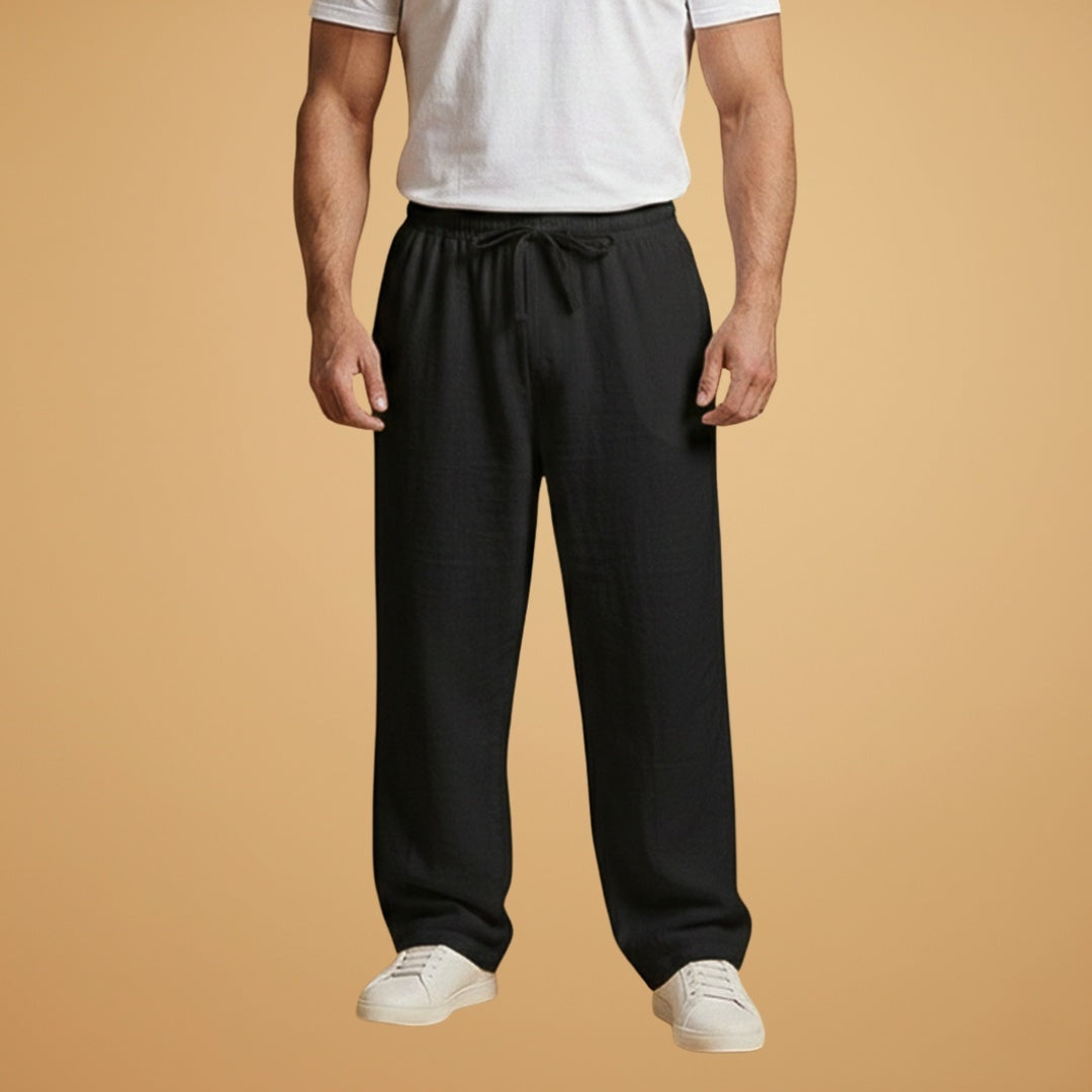 Calças de linho respiráveis para homem, perna larga e cintura elástica. Conforto e elegância no verão.