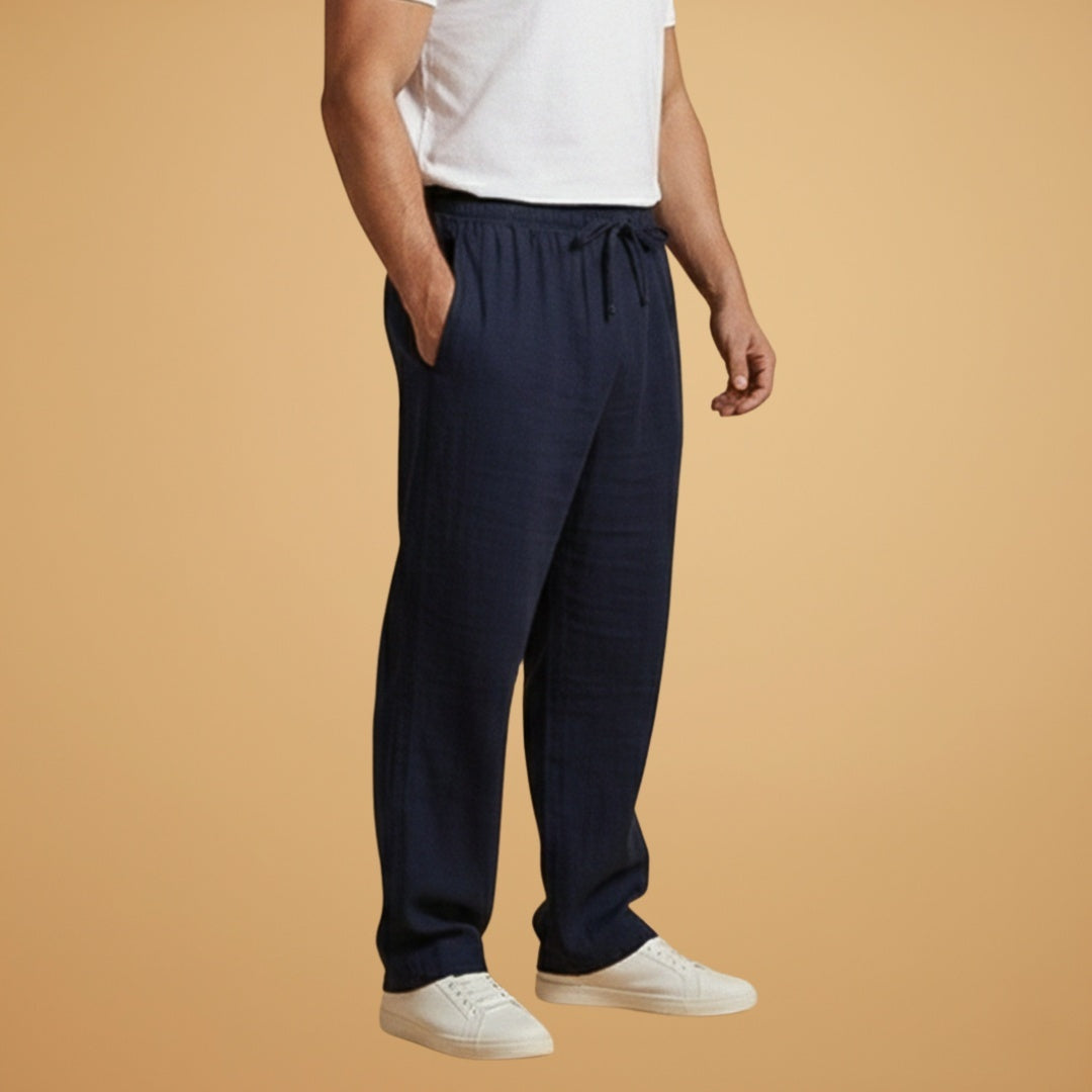 Elegantes calças de linho para homem, perna larga, cintura elástica, perfeitas para um look casual de verão.