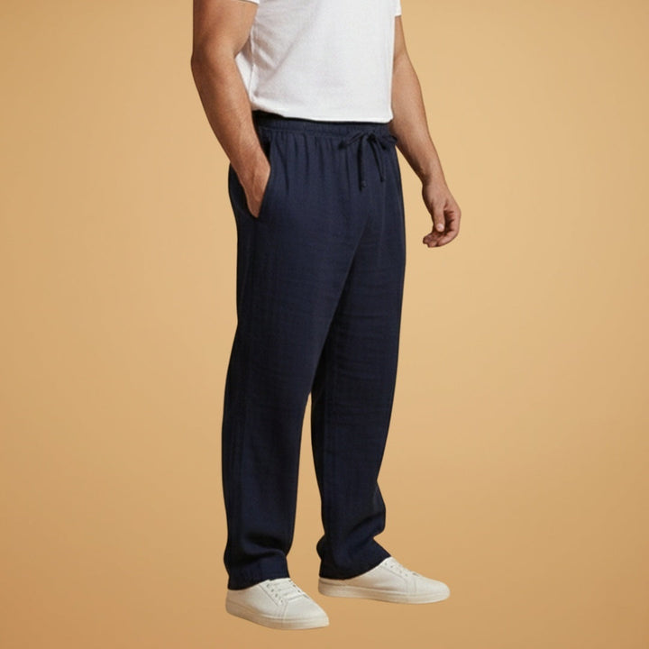Elegantes calças de linho para homem, perna larga, cintura elástica, perfeitas para um look casual de verão.