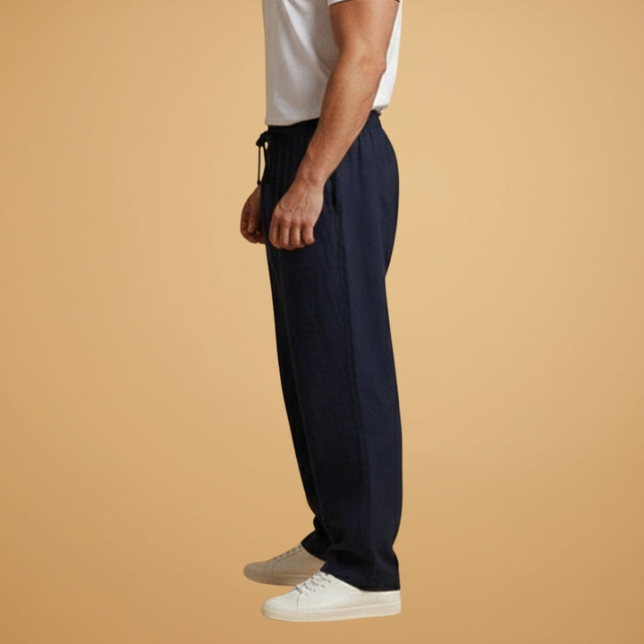 Calças de linho masculinas de perna larga, cintura elástica. Peça confortável e casual para o verão.
