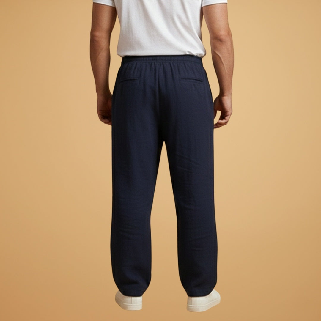Confortáveis calças de linho masculinas, perna larga, cintura elástica. Perfeitas para dias quentes de verão.
