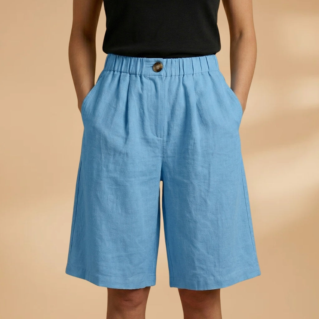 Calções femininos de verão, estilo bermuda, com cintura elástica e caimento perfeito.