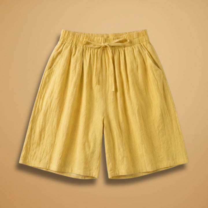 Calções bermudas femininos casuais até ao joelho com cintura elástica para conforto no verão.