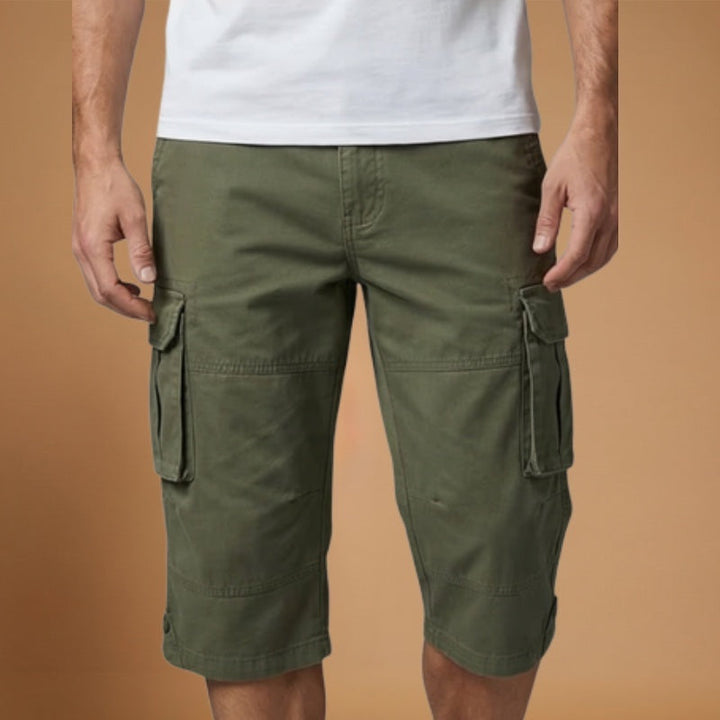 Calções cargo homem confortáveis com vários bolsos, perfeitos para atividades de verão. Ajustáveis e práticos.