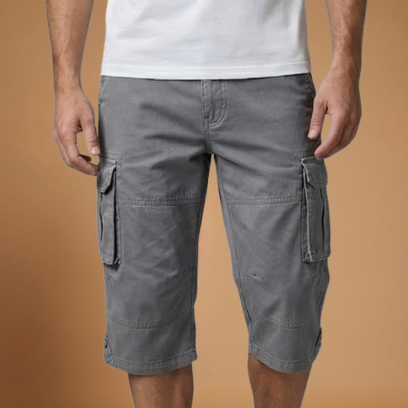 Calções cargo masculinos versáteis com bolsos, perfeitos para outfits de verão casuais. Conforto e funcionalidade.