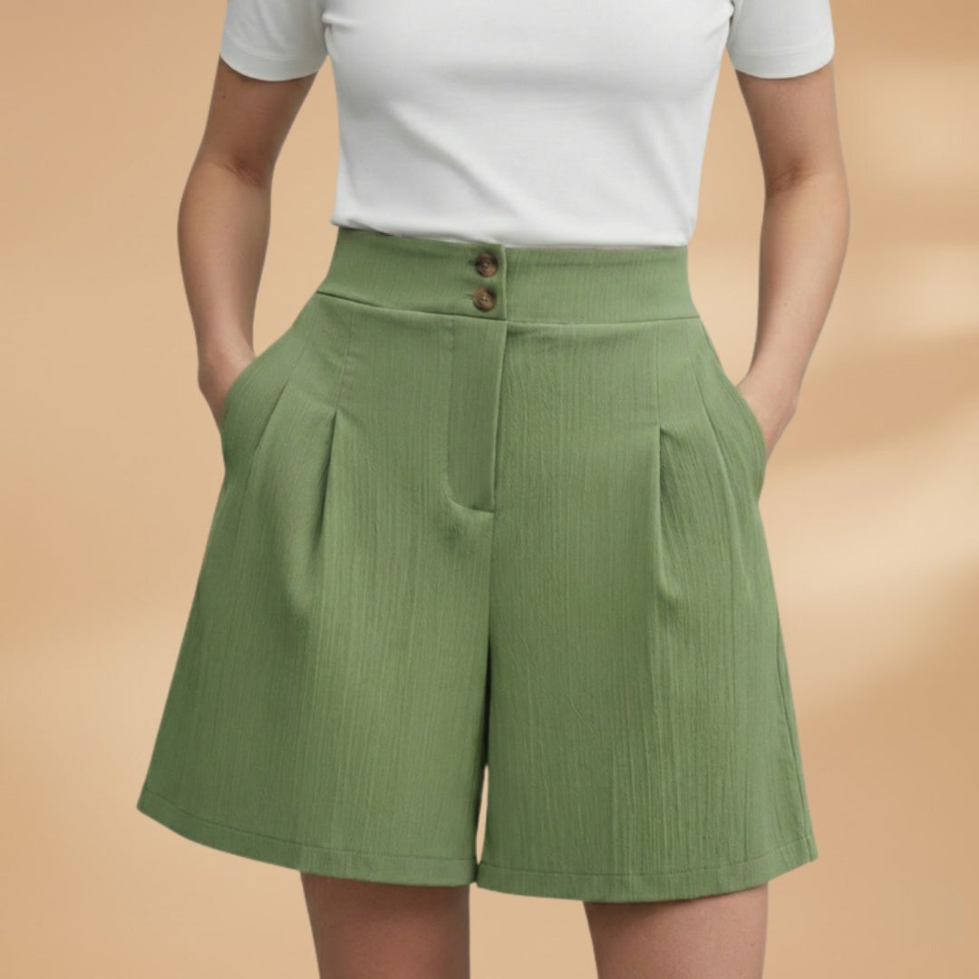 Calções femininos cintura alta com botões, opção elegante para um look de verão semi-formal.