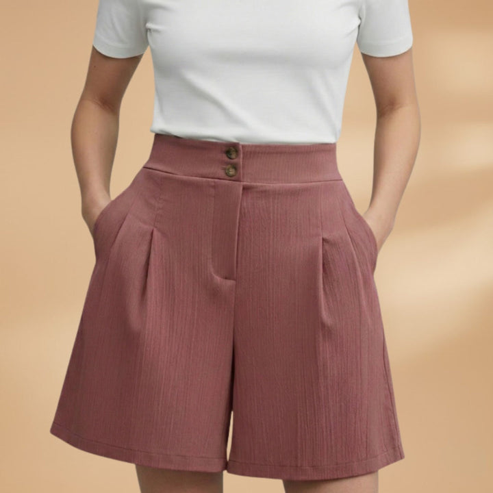 Calções femininos chiques de cintura alta com botões, realçam qualquer conjunto de verão com estilo.