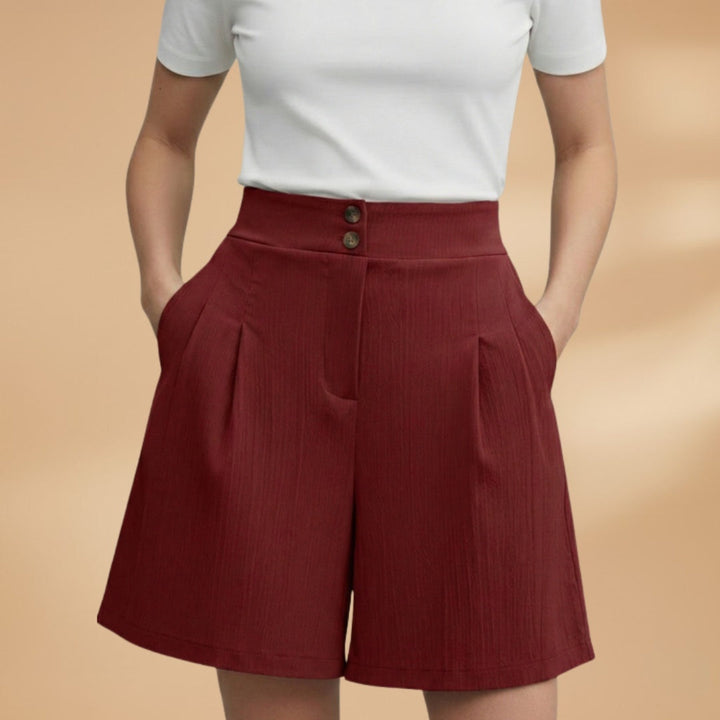 Calções femininos de cintura alta com botões, um statement de moda para o vestuário de verão.