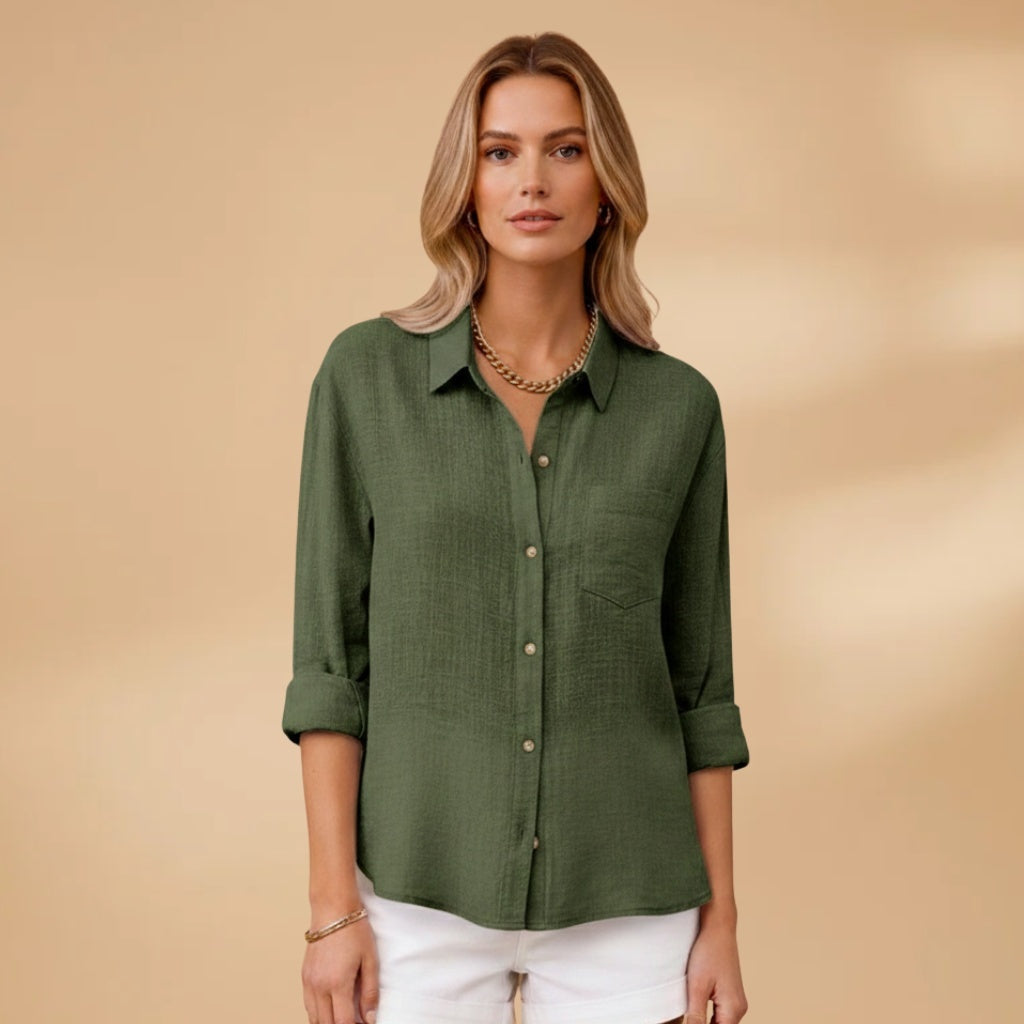 Camisa de linho feminina com manga comprida e botões, tecido respirável que oferece conforto durante o uso.