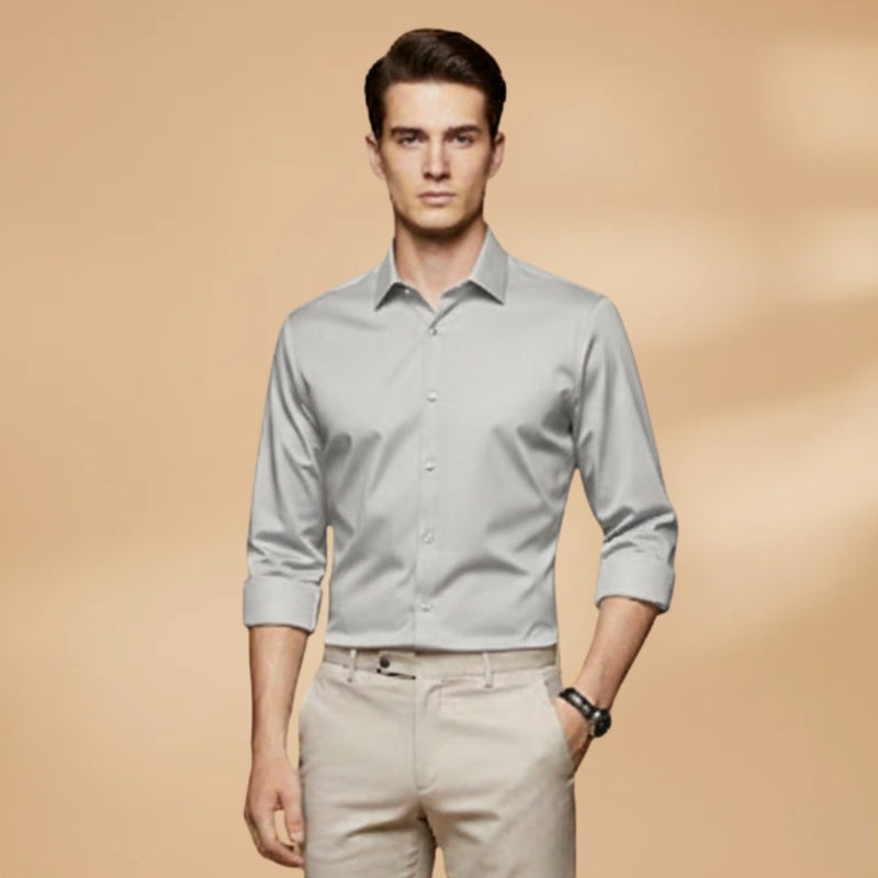 Camisa social masculina elegante, corte slim fit e manga comprida, com design de colarinho clássico e moderno.